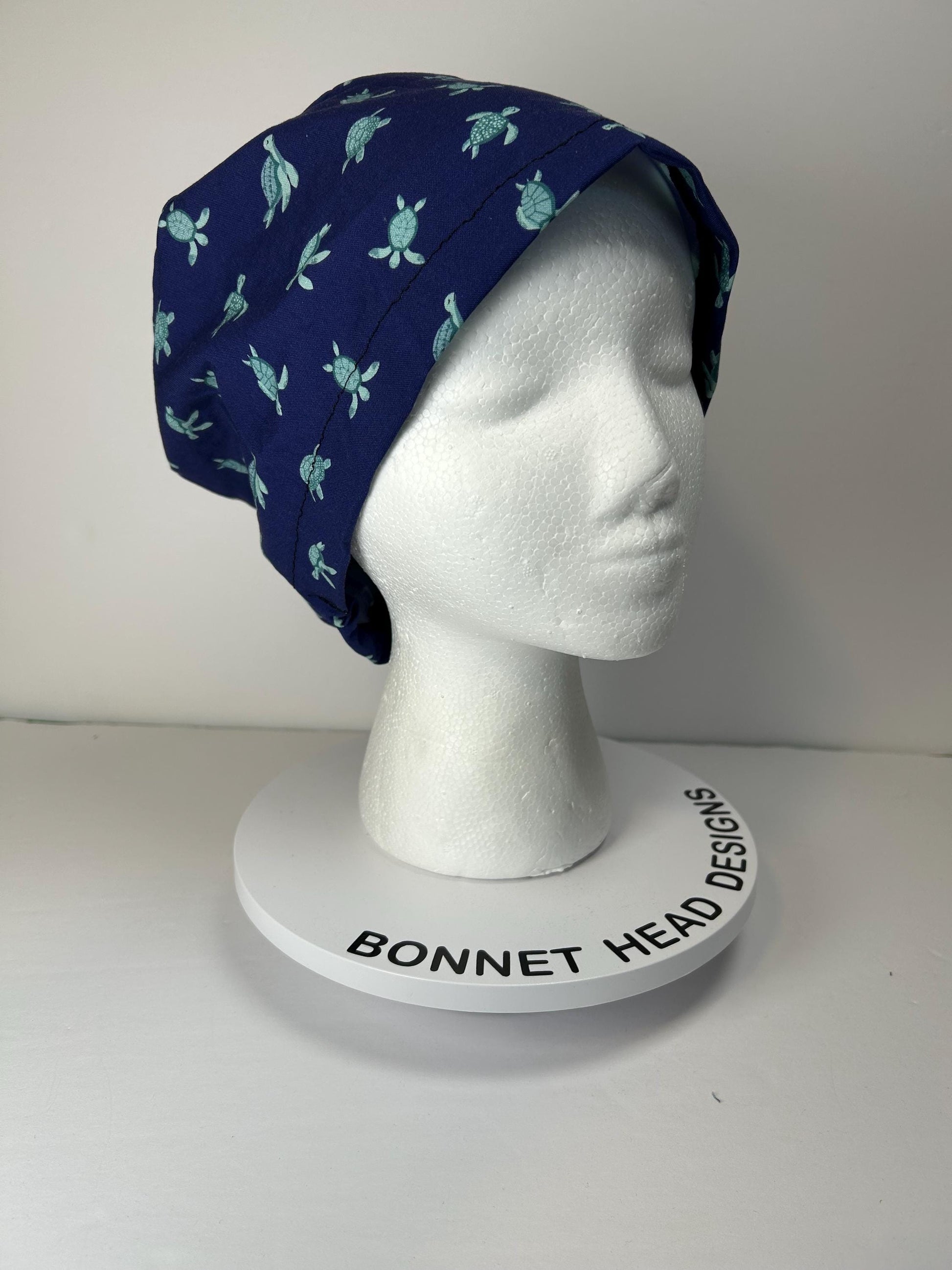 Navy Sea turtle euro style scrub cap, women’s turtle print scrub cap with toggle, Bonnet Head Designs