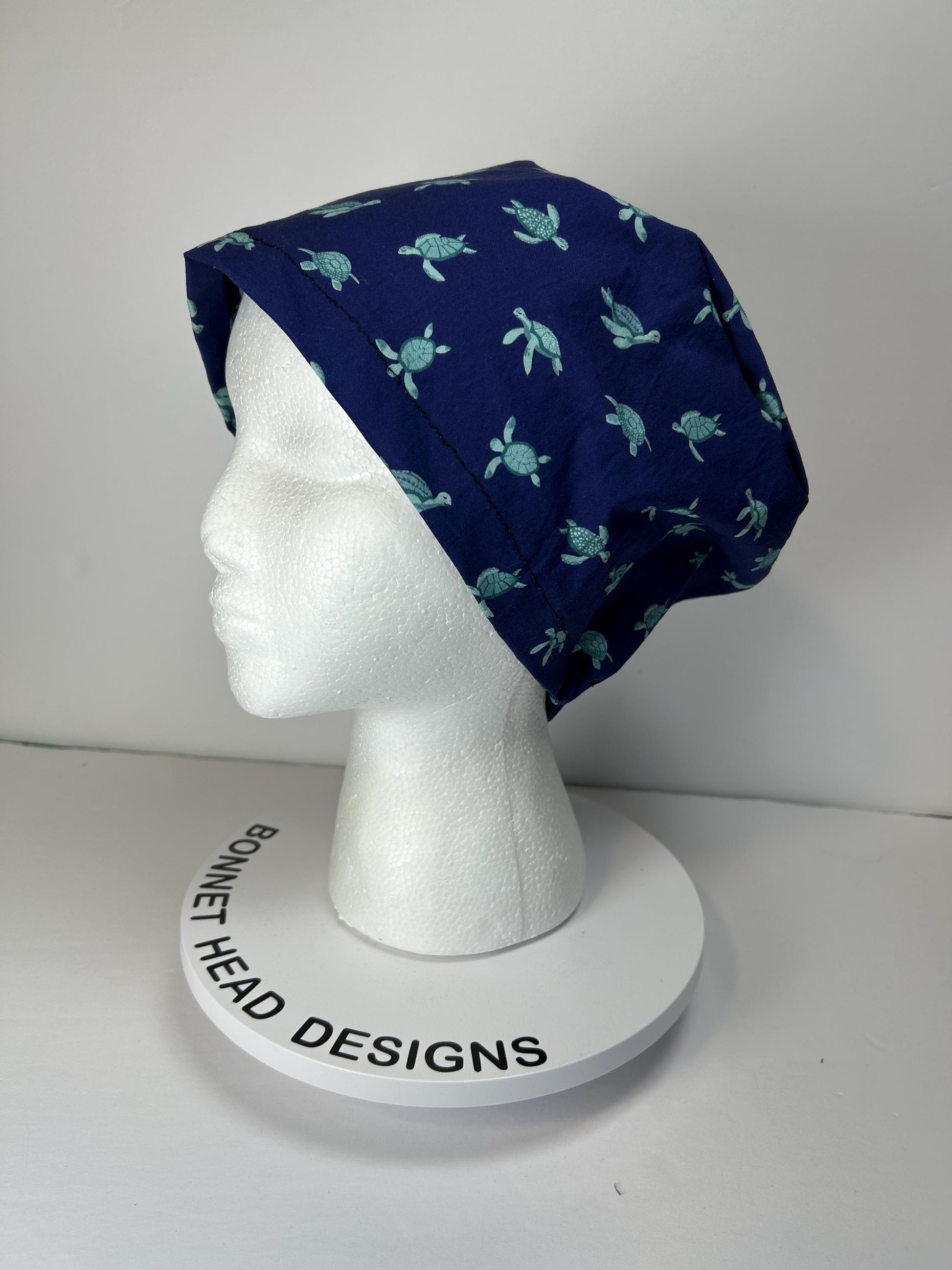 Navy Sea turtle euro style scrub cap, women’s turtle print scrub cap with toggle, Bonnet Head Designs