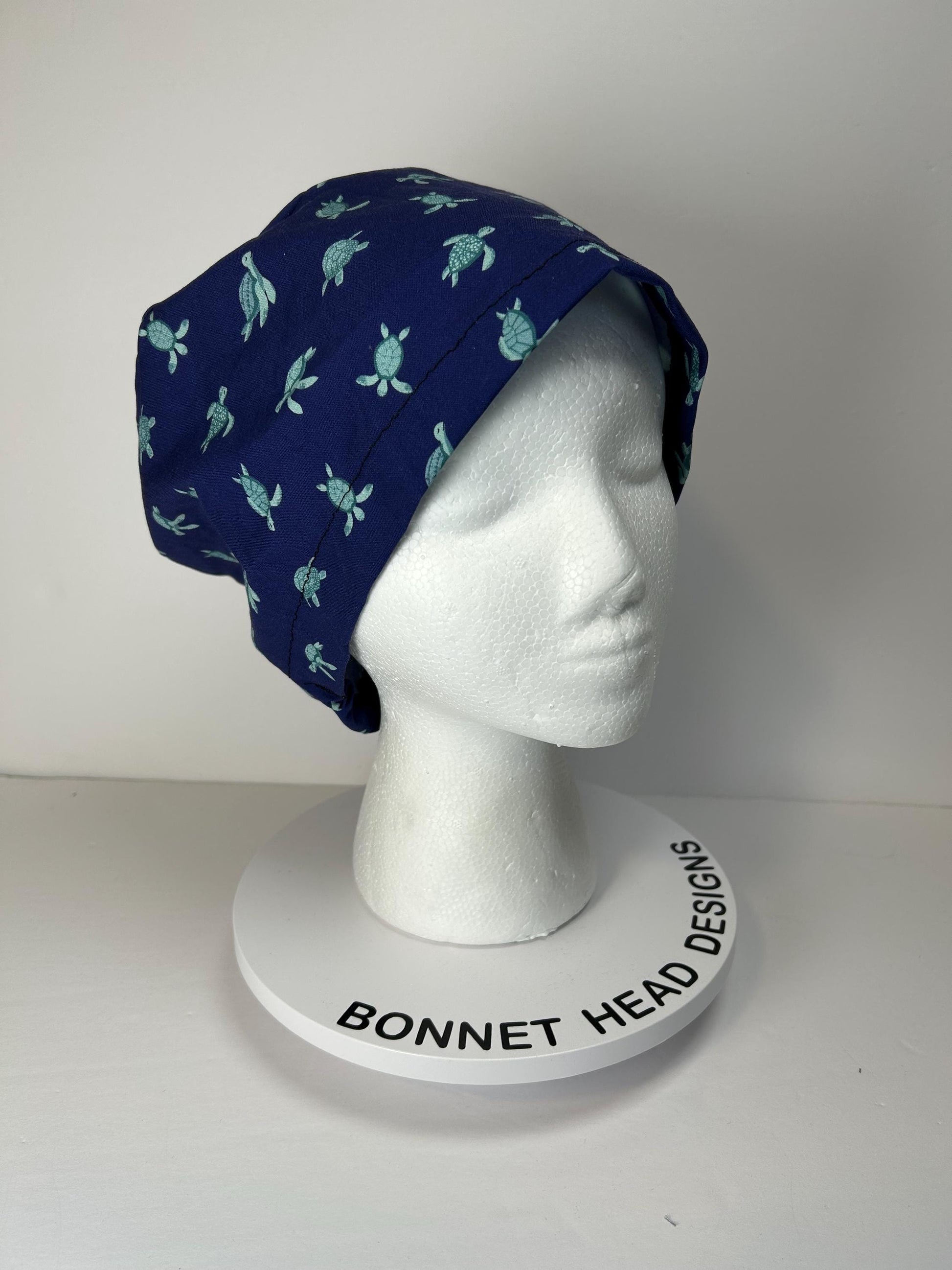 Navy Sea turtle euro style scrub cap, women’s turtle print scrub cap with toggle, Bonnet Head Designs