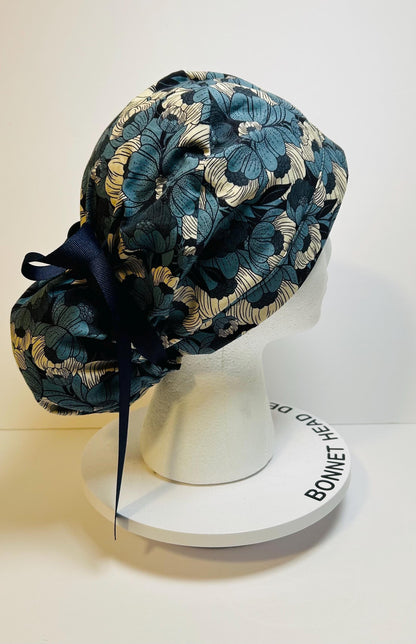 Wild Flora blue ponytail scrub hat, blue floral surgical hat with adjustable pouch, Bonnet Head Designs