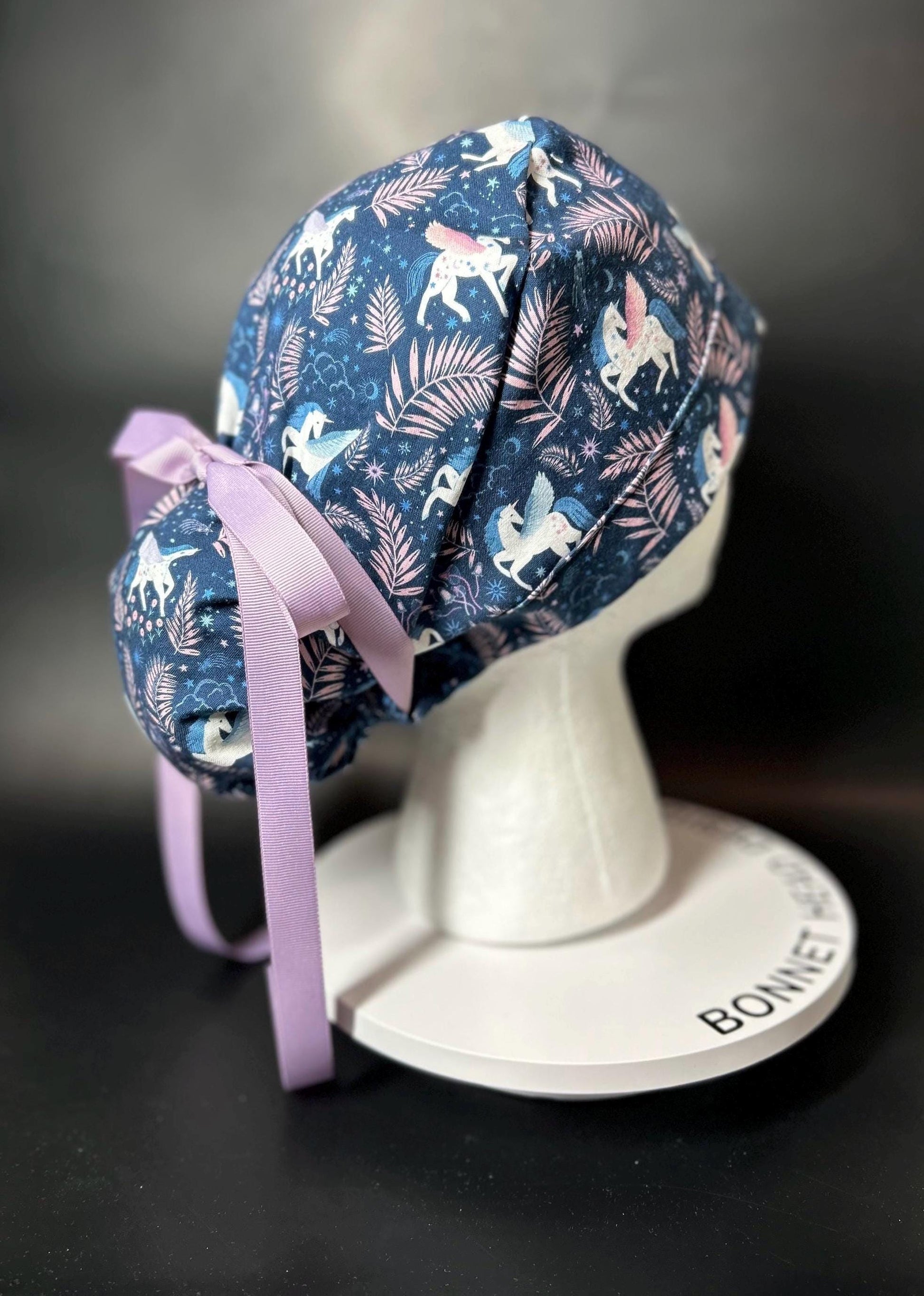 Stargazer Heavenly in Midnight unicorn ponytail scrub hat, women’s navy unicorns scrub cap
