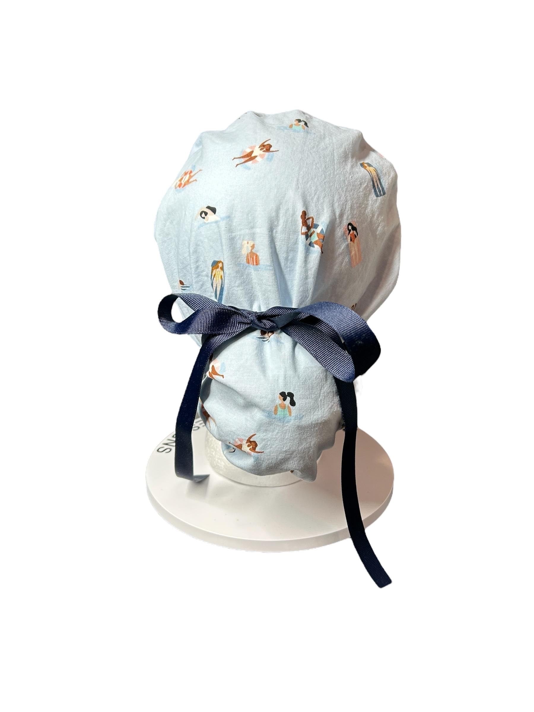 Float Away Sunshine Story ponytail scrub cap, blue summer swim print adjustable pocket ponytail scrub hat