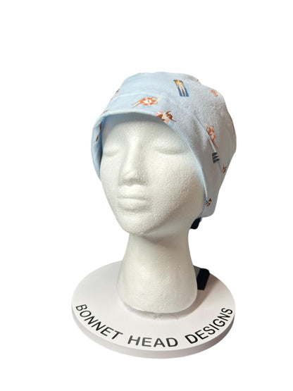 Float Away Sunshine Story ponytail scrub cap, blue summer swim print adjustable pocket ponytail scrub hat