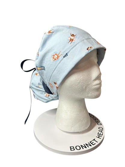 Float Away Sunshine Story ponytail scrub cap, blue summer swim print adjustable pocket ponytail scrub hat