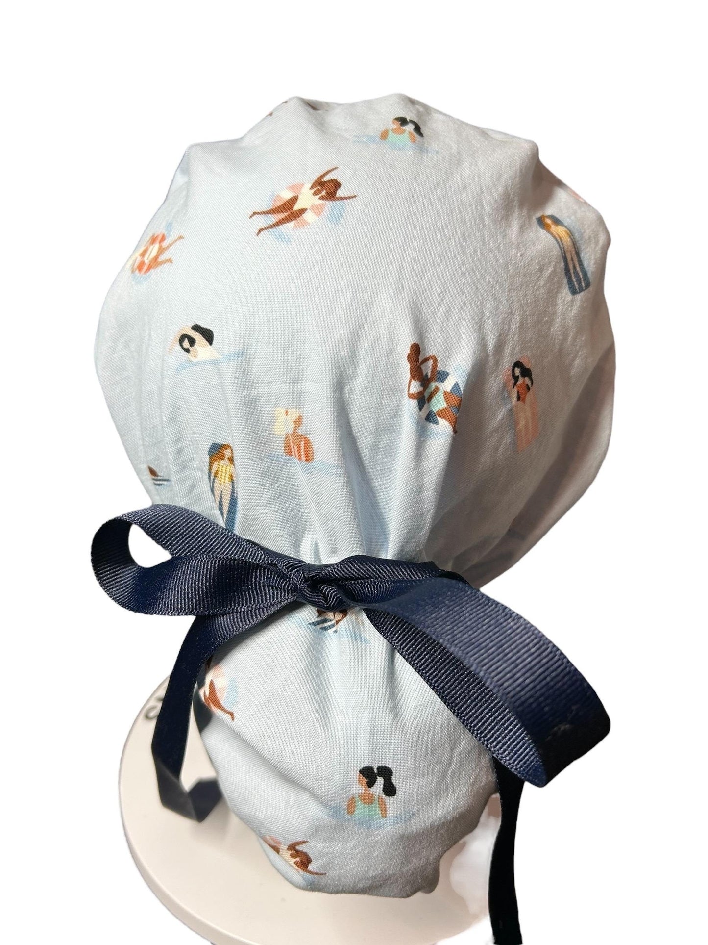Float Away Sunshine Story ponytail scrub cap, blue summer swim print adjustable pocket ponytail scrub hat