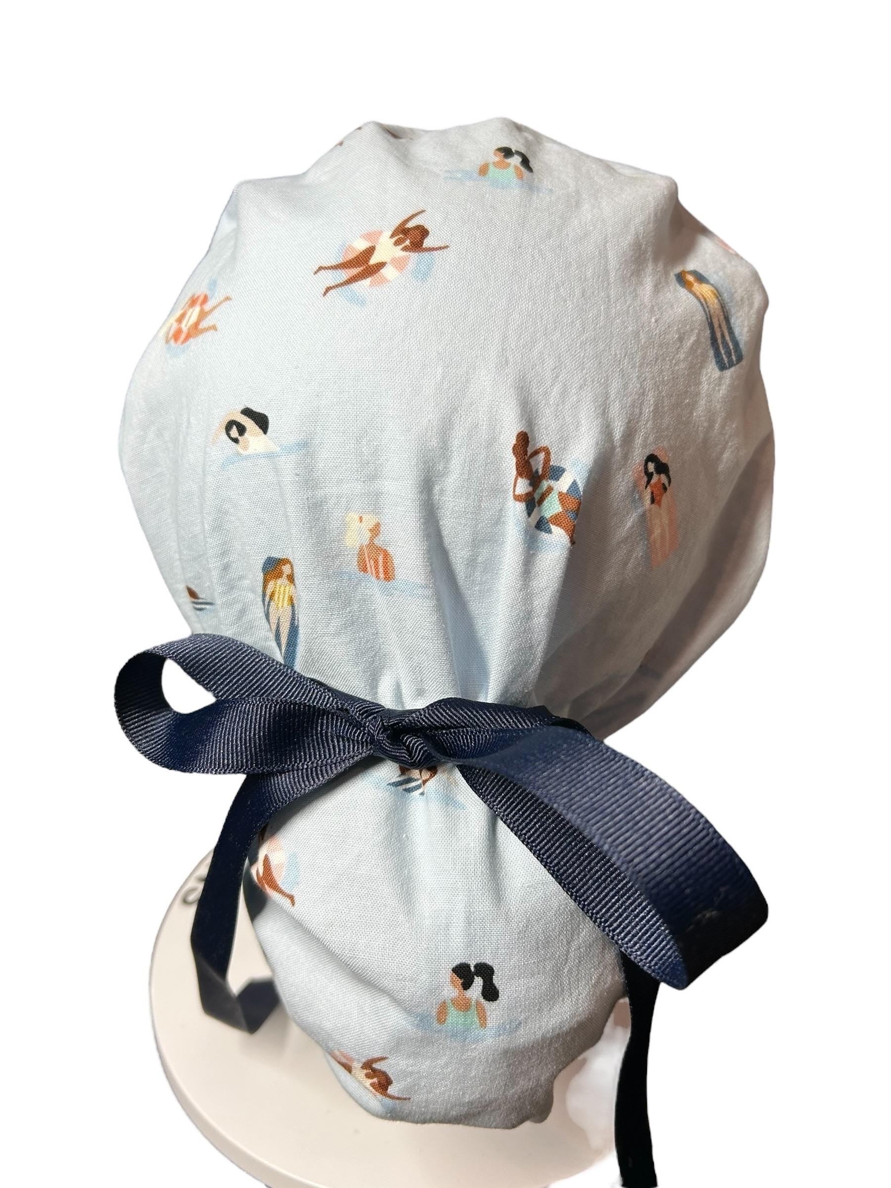 Float Away Sunshine Story ponytail scrub cap, blue summer swim print adjustable pocket ponytail scrub hat