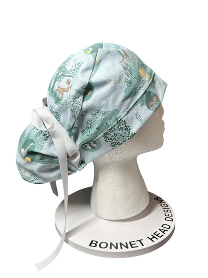 Forest Fable in Seagram ponytail scrub cap, women’s forest print scrub hat with cinch ties and satin lining option