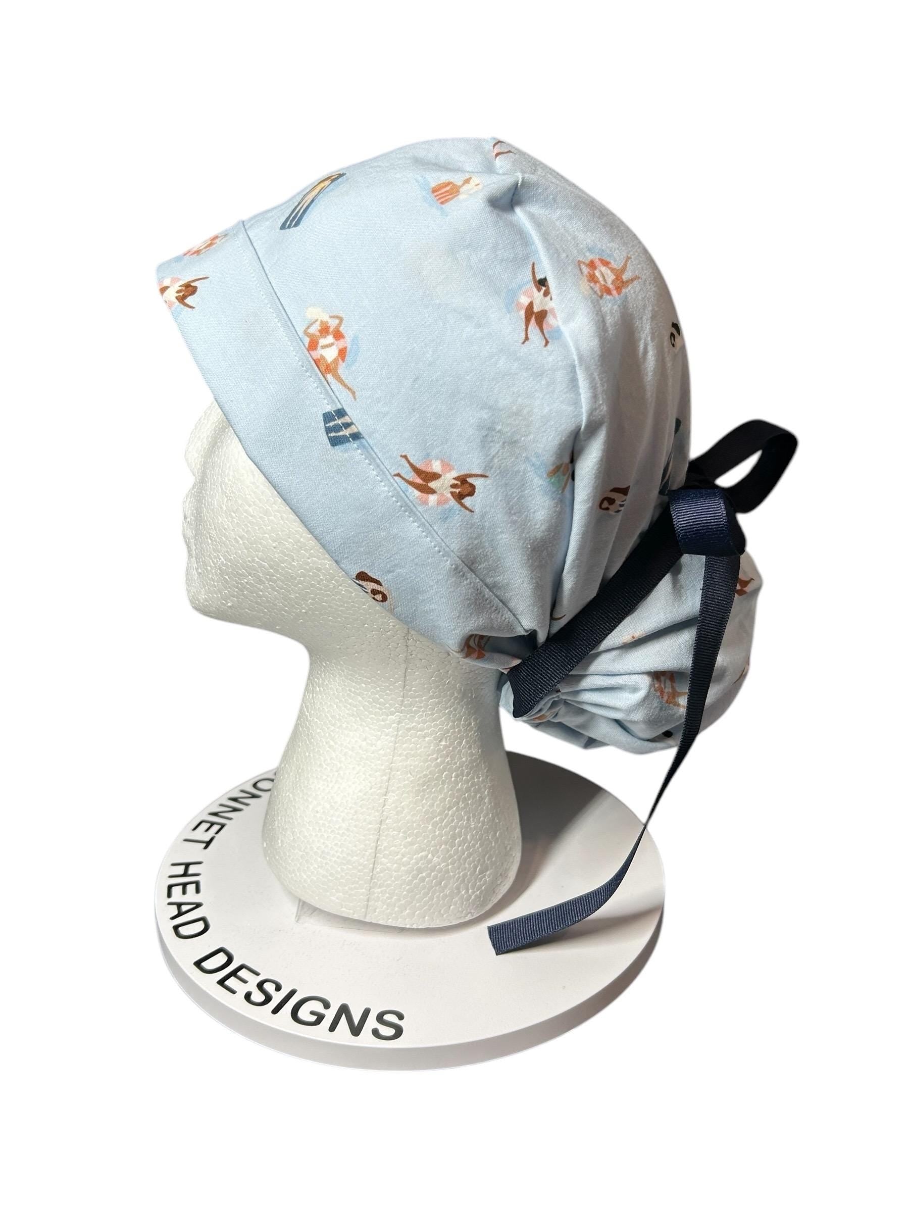 Float Away Sunshine Story ponytail scrub cap, blue summer swim print adjustable pocket ponytail scrub hat