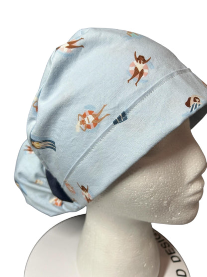 Float Away Sunshine Story ponytail scrub cap, blue summer swim print adjustable pocket ponytail scrub hat