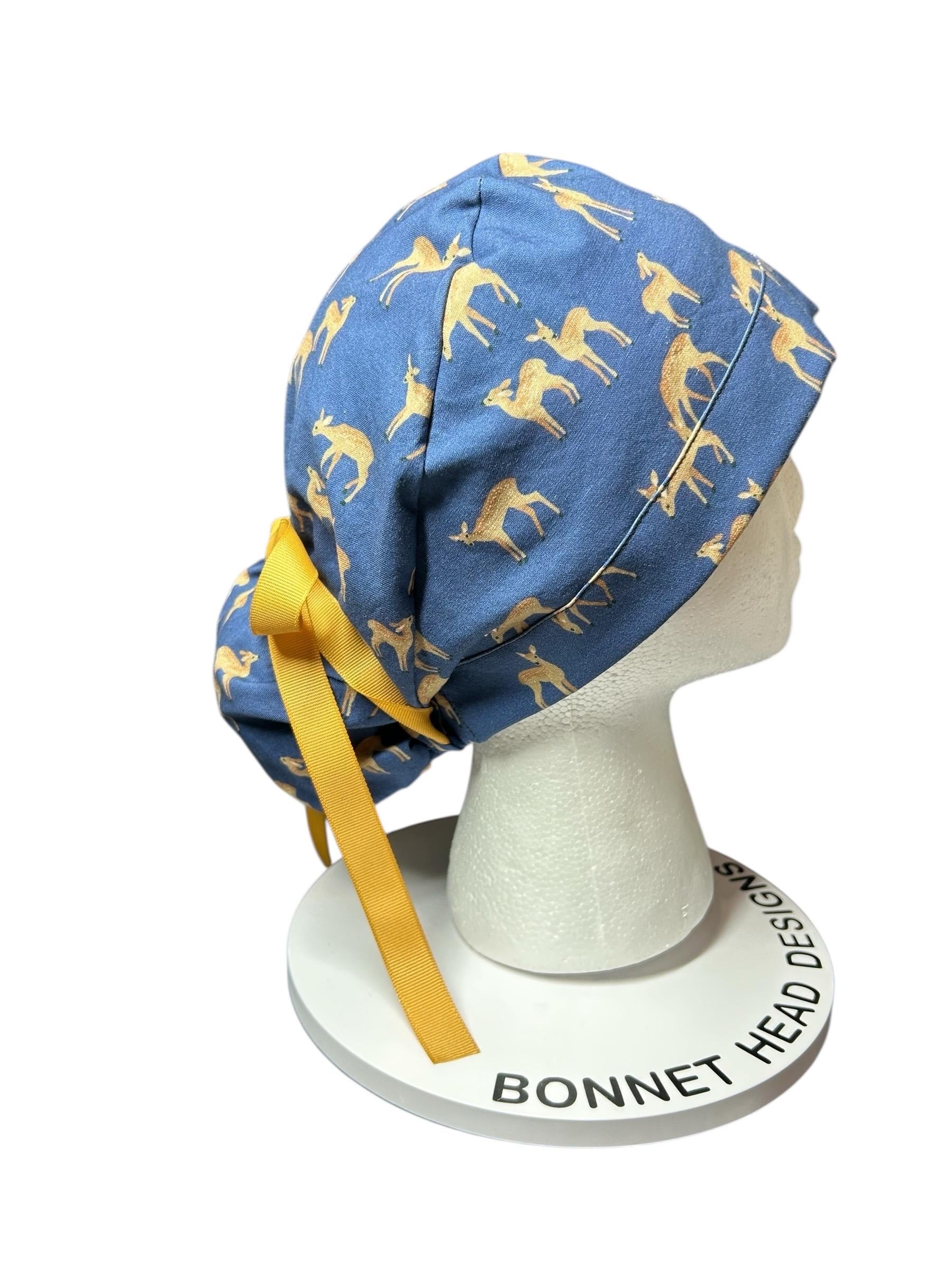 Forest Fable Fawn ponytail scrub cap, women’s navy deer print scrub hat with cinch ties and satin lining option