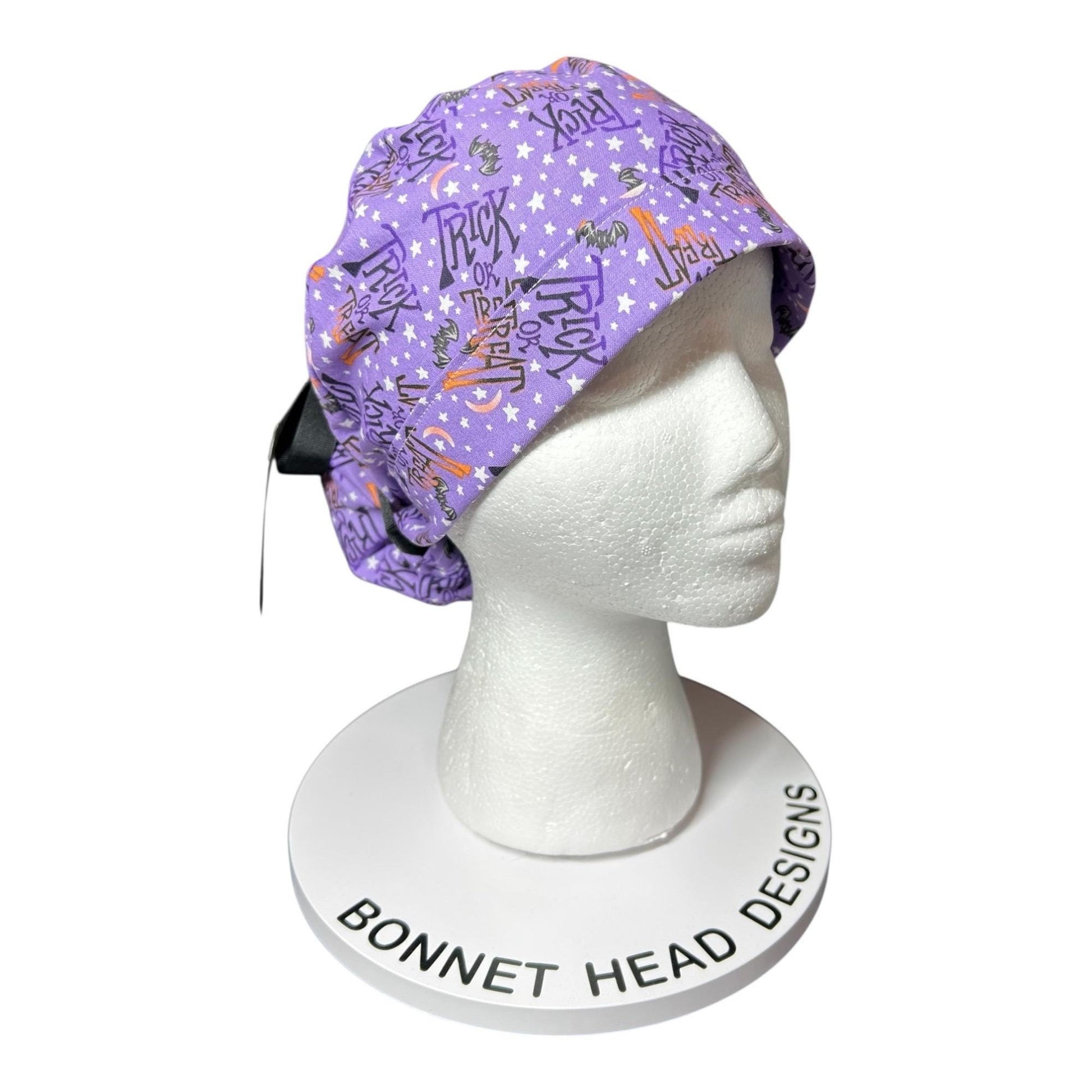 Ponytail Scrub Cap: Women's Halloween nurse hat, purple trick or treat fabric