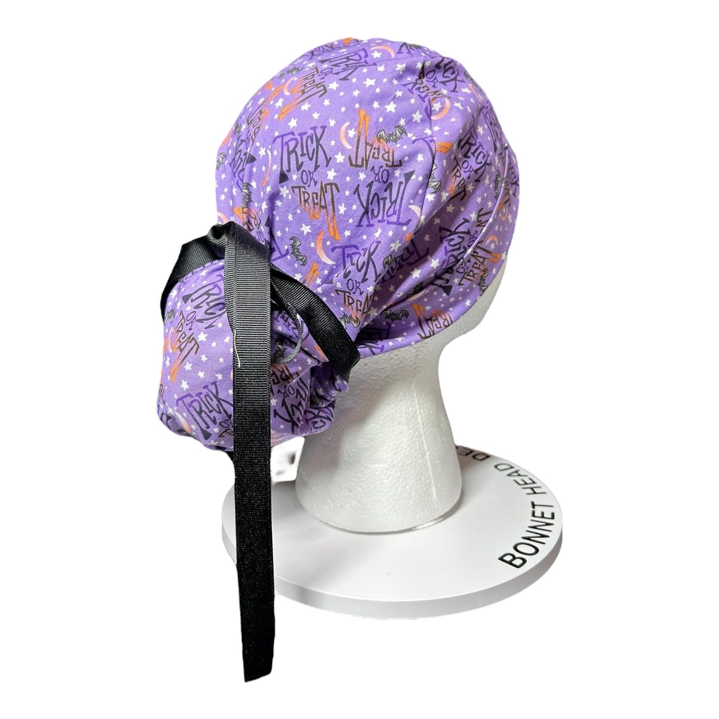 Ponytail Scrub Cap: Women's Halloween nurse hat, purple trick or treat fabric