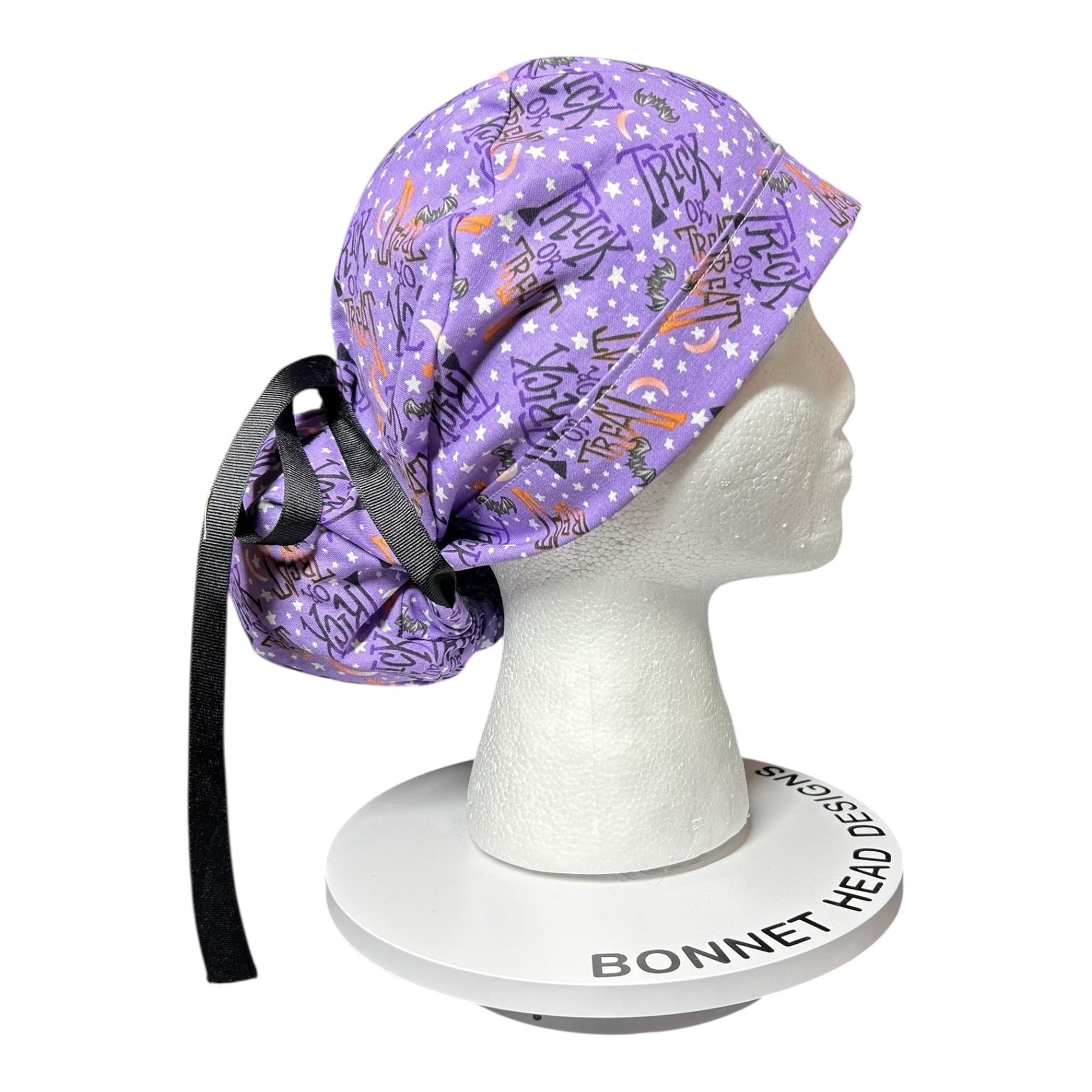 Ponytail Scrub Cap: Women's Halloween nurse hat, purple trick or treat fabric
