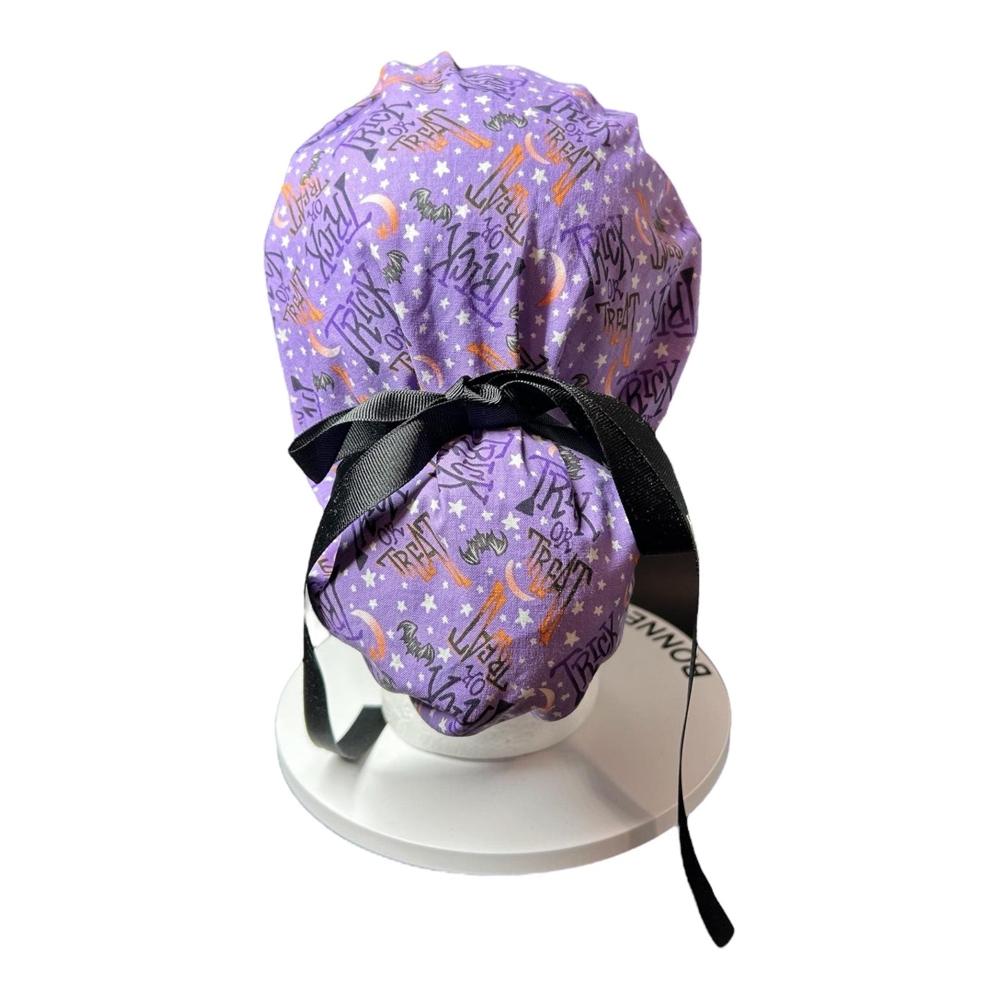 Ponytail Scrub Cap: Women's Halloween nurse hat, purple trick or treat fabric