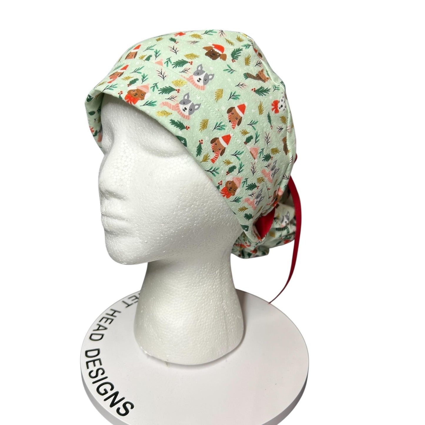 Christmas Dog Scrub Cap: Women's Ponytail Hat in green Merry Pawmas Fabric