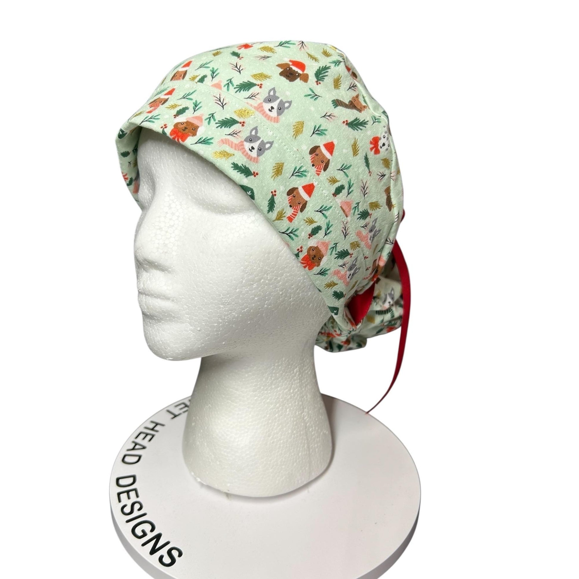 Christmas Dog Scrub Cap: Women's Ponytail Hat in green Merry Pawmas Fabric
