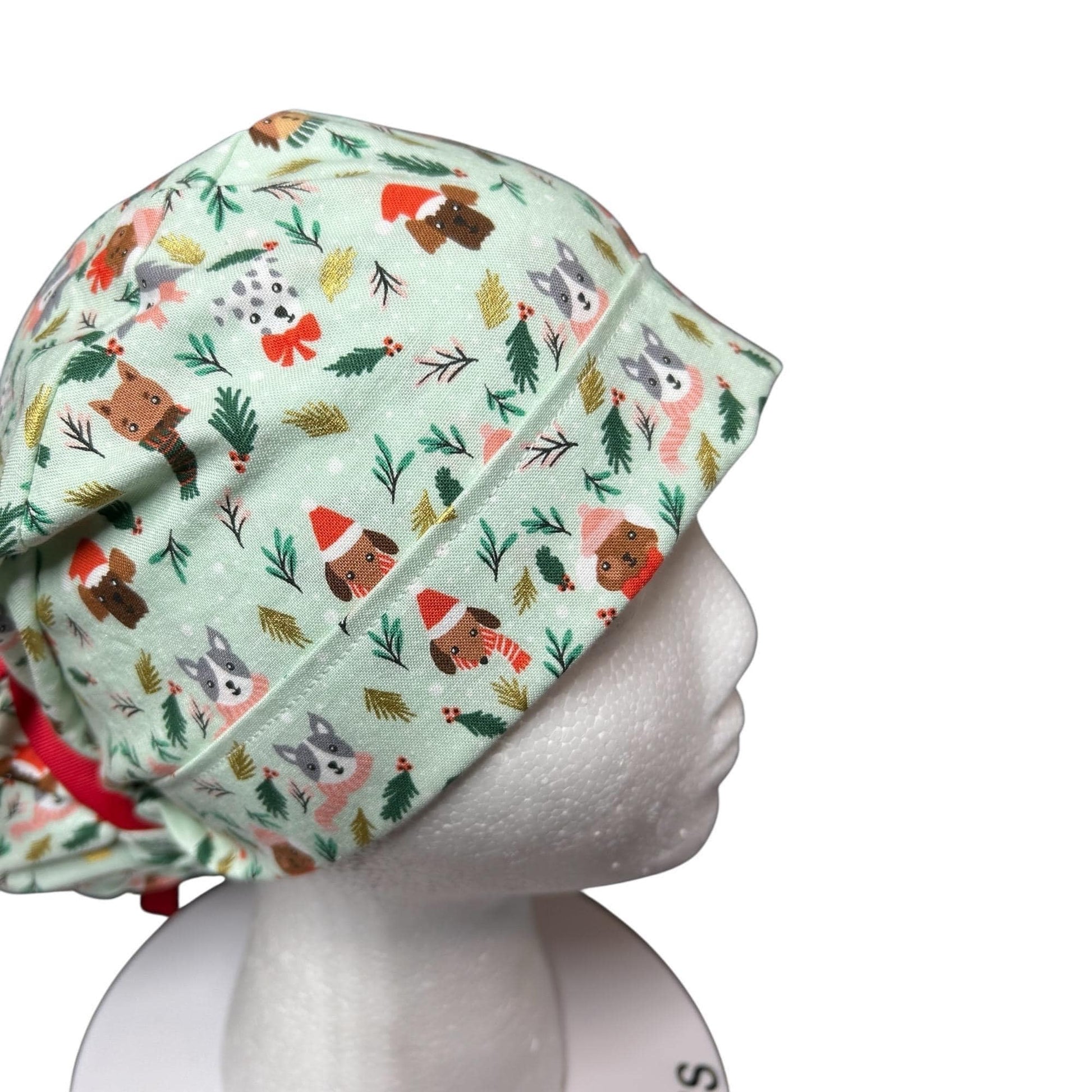 Christmas Dog Scrub Cap: Women's Ponytail Hat in green Merry Pawmas Fabric