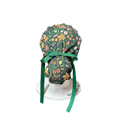 Floral Scrub Hat: Green Spring Fabric, Bun/Ponytail Style