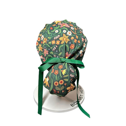 Floral Scrub Hat: Green Spring Fabric, Bun/Ponytail Style