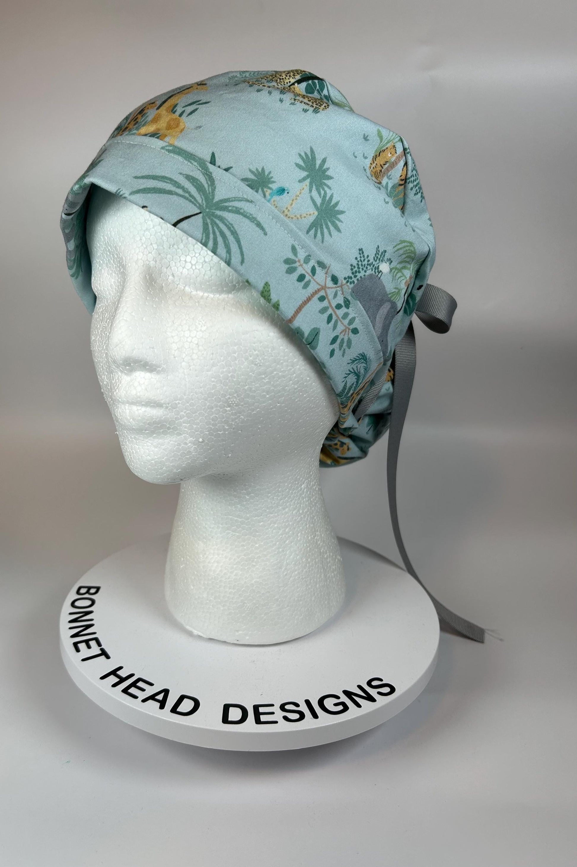Jungle print ponytail scrub hat, elephant and giraffe print surgical cap, Bonnet Head Designs