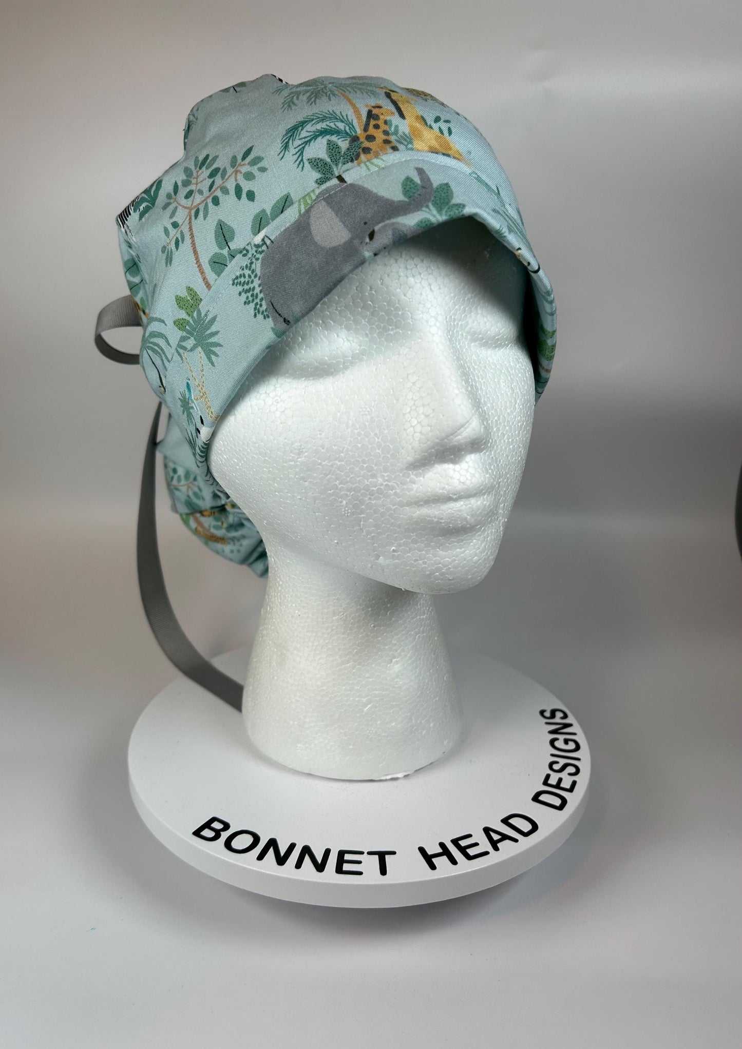 Jungle print ponytail scrub hat, elephant and giraffe print surgical cap, Bonnet Head Designs
