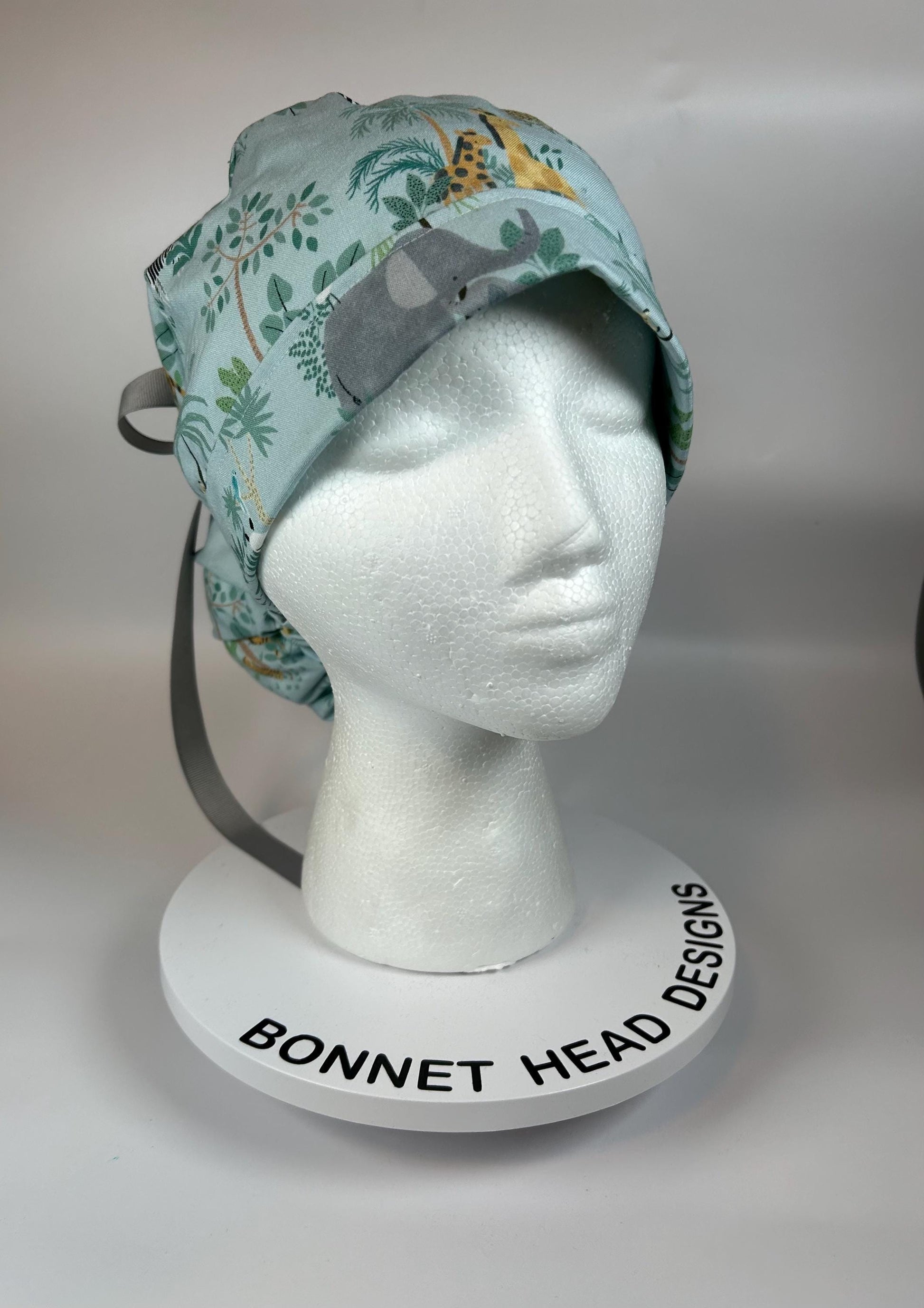 Jungle print ponytail scrub hat, elephant and giraffe print surgical cap, Bonnet Head Designs