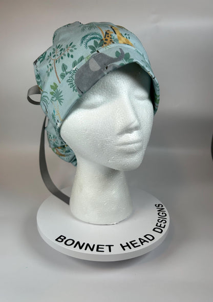 Jungle print ponytail scrub hat, elephant and giraffe print surgical cap, Bonnet Head Designs