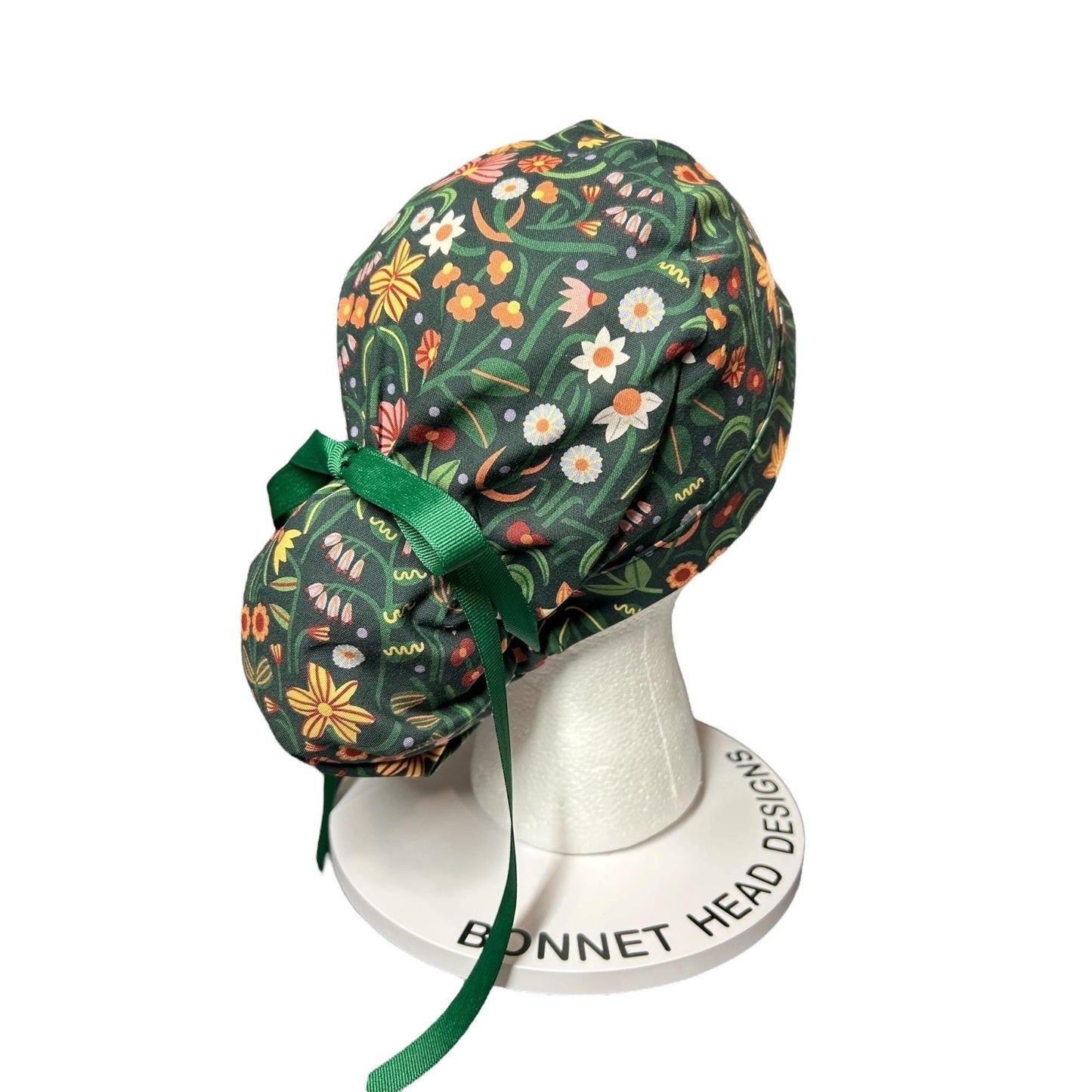 Floral Scrub Hat: Green Spring Fabric, Bun/Ponytail Style