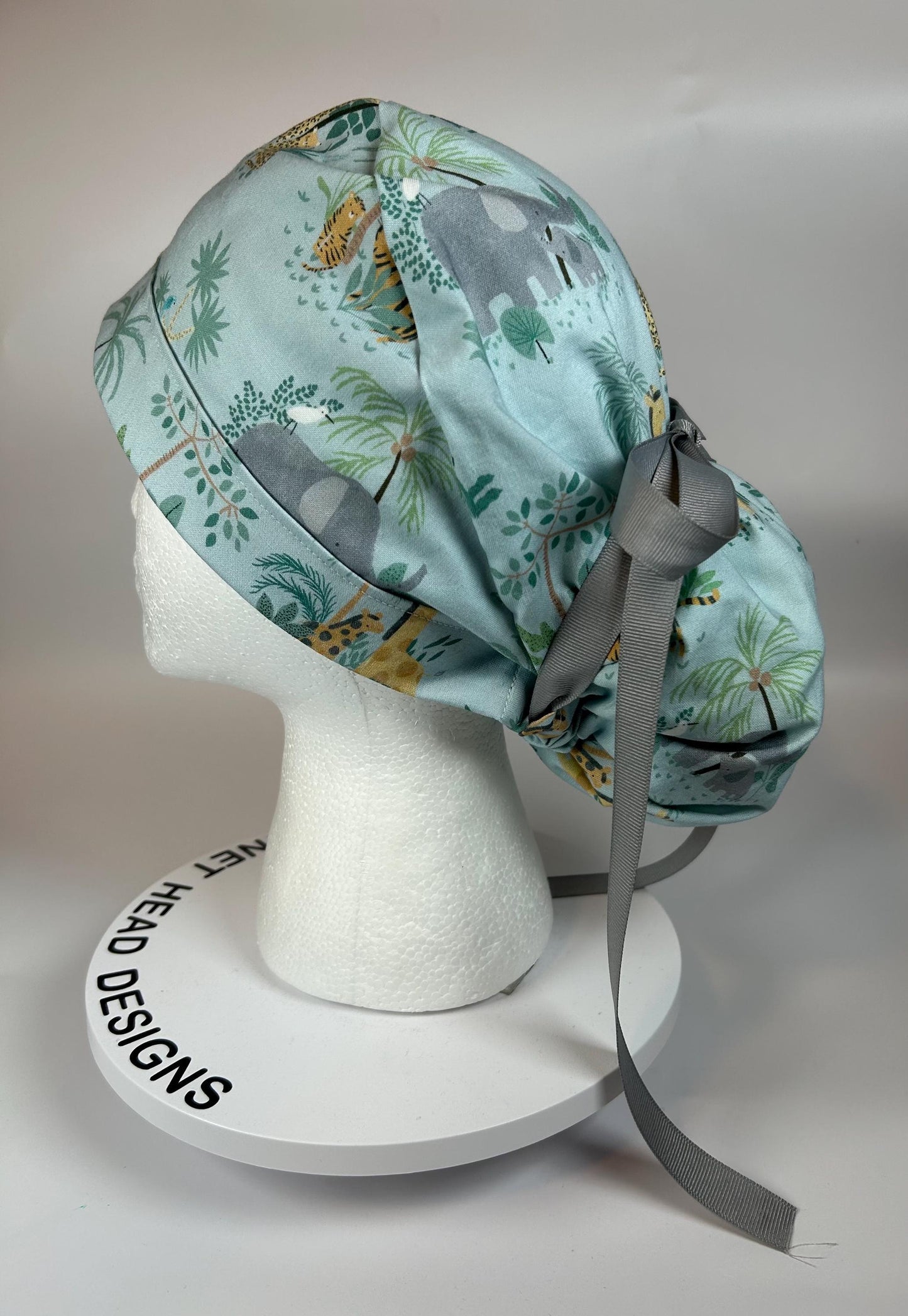 Jungle print ponytail scrub hat, elephant and giraffe print surgical cap, Bonnet Head Designs