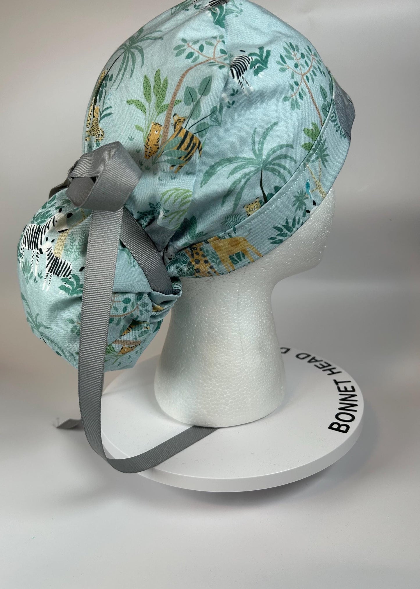 Jungle print ponytail scrub hat, elephant and giraffe print surgical cap, Bonnet Head Designs