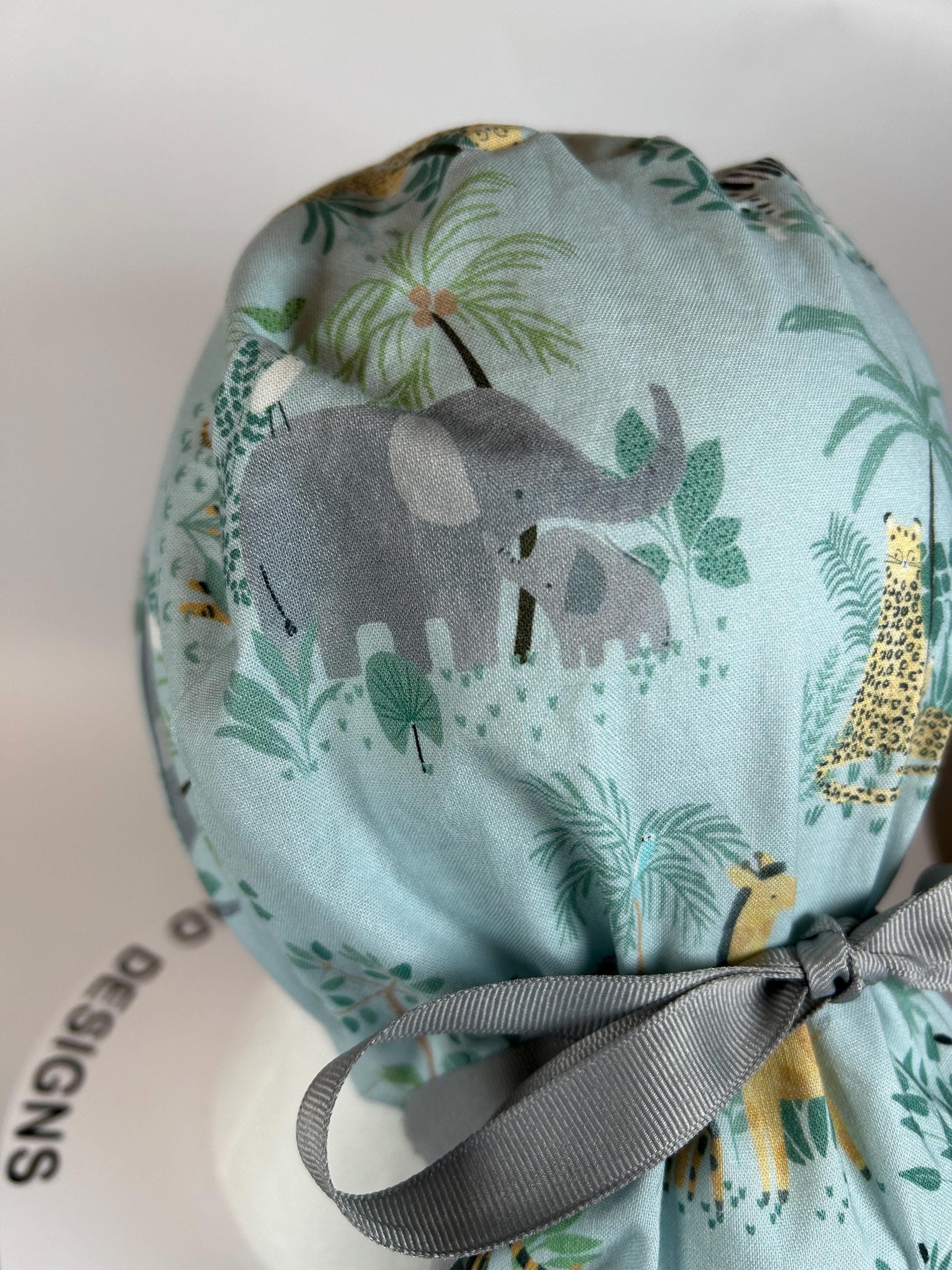 Jungle print ponytail scrub hat, elephant and giraffe print surgical cap, Bonnet Head Designs