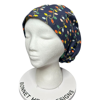 Navy Christmas Lights Euro Style Toggle Scrub hat: Rifle Paper Co fabric