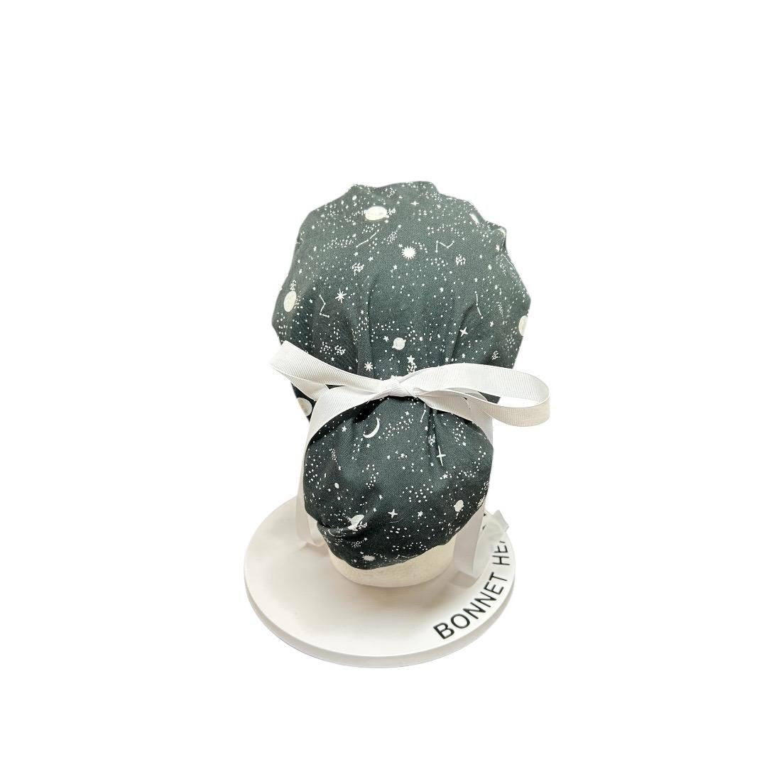 Night sky ponytail scrub hat: Black and white space print fabric with ribbon ties
