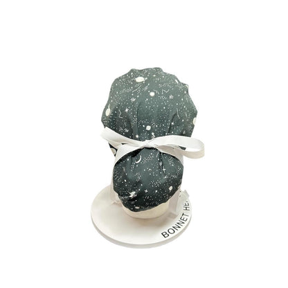 Night sky ponytail scrub hat: Black and white space print fabric with ribbon ties