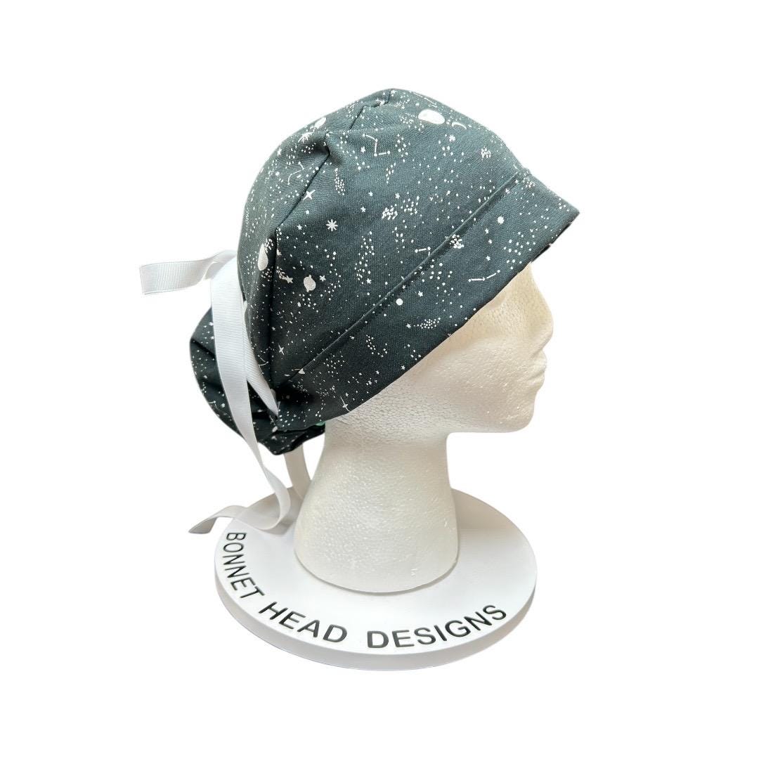 Night sky ponytail scrub hat: Black and white space print fabric with ribbon ties
