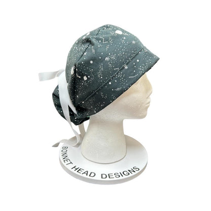 Night sky ponytail scrub hat: Black and white space print fabric with ribbon ties