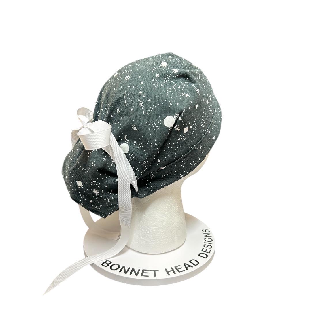 Night sky ponytail scrub hat: Black and white space print fabric with ribbon ties