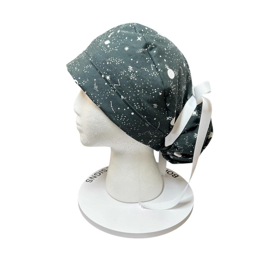 Night sky ponytail scrub hat: Black and white space print fabric with ribbon ties