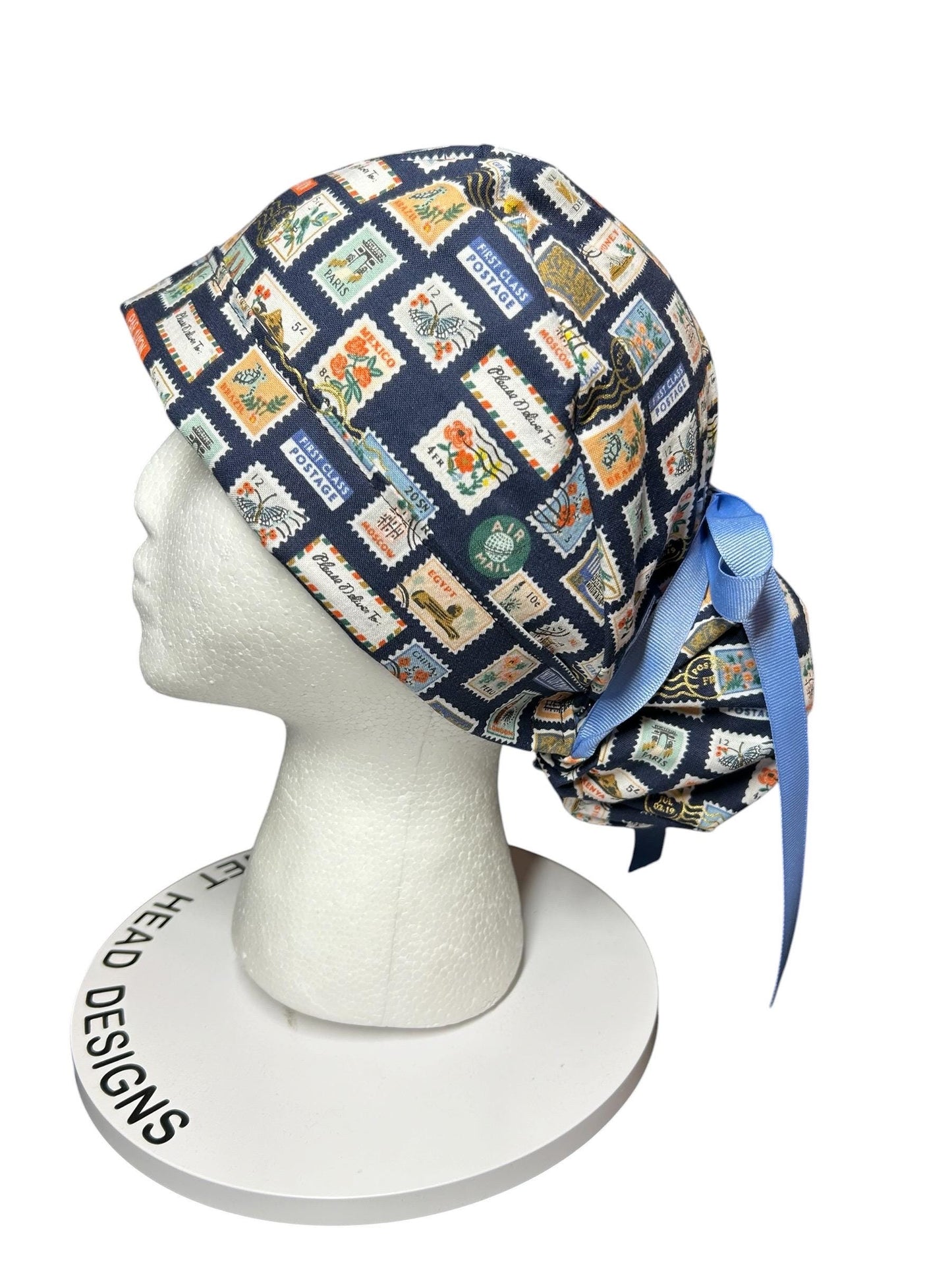 Women’s scrub cap: Rifle Paper Co navy stamp print with ribbon ties