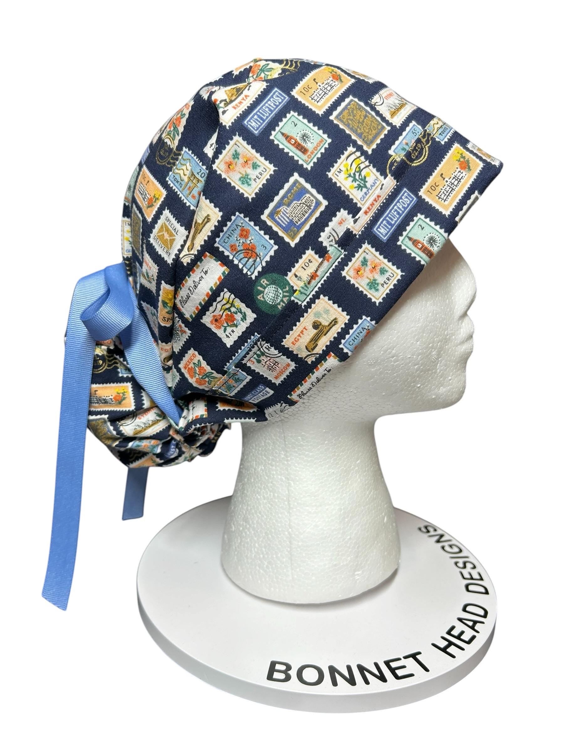 Women’s scrub cap: Rifle Paper Co navy stamp print with ribbon ties