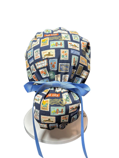 Women’s scrub cap: Rifle Paper Co navy stamp print with ribbon ties