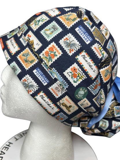 Women’s scrub cap: Rifle Paper Co navy stamp print with ribbon ties