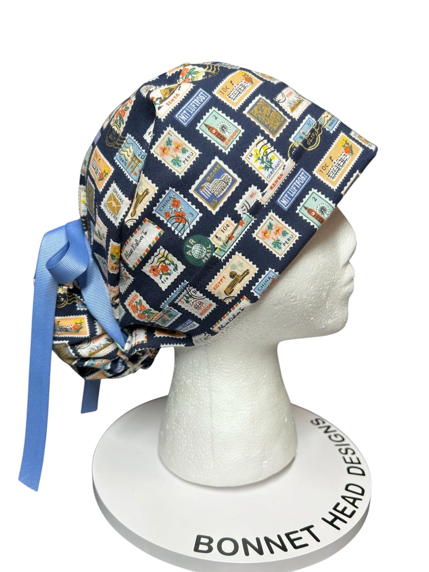 Women’s scrub cap: Rifle Paper Co navy stamp print with ribbon ties