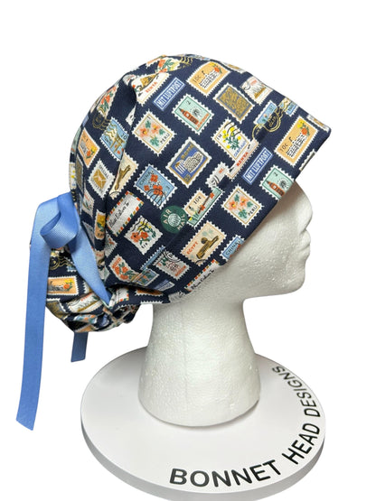 Women’s scrub cap: Rifle Paper Co navy stamp print with ribbon ties