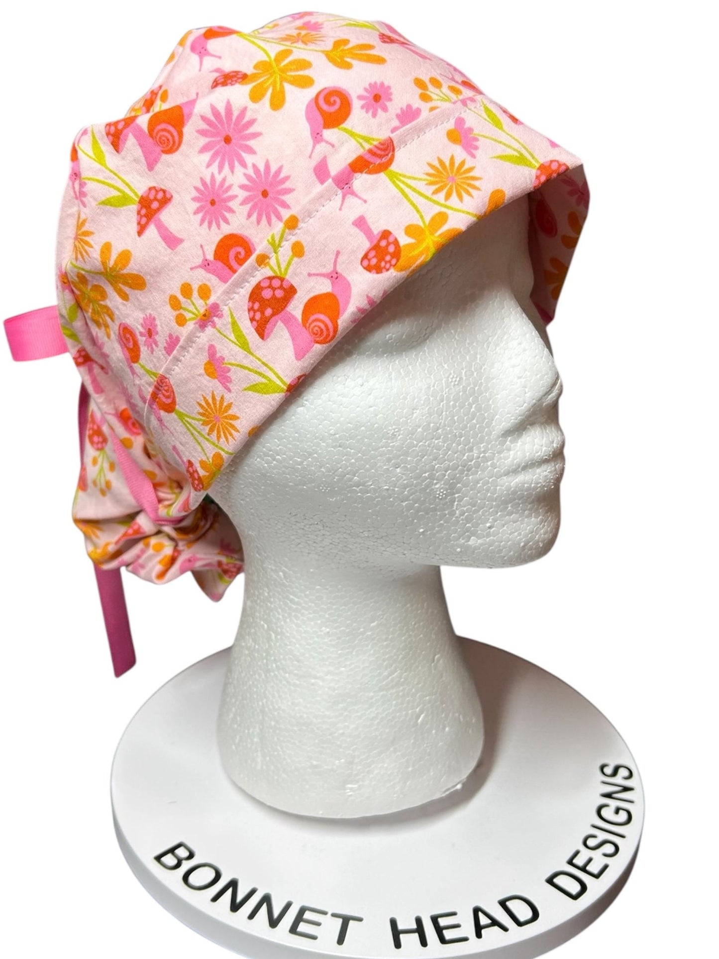 Women’s Ponytail Scrub Cap: Adjustable Cotton Scrub Hat in pink snail fabric