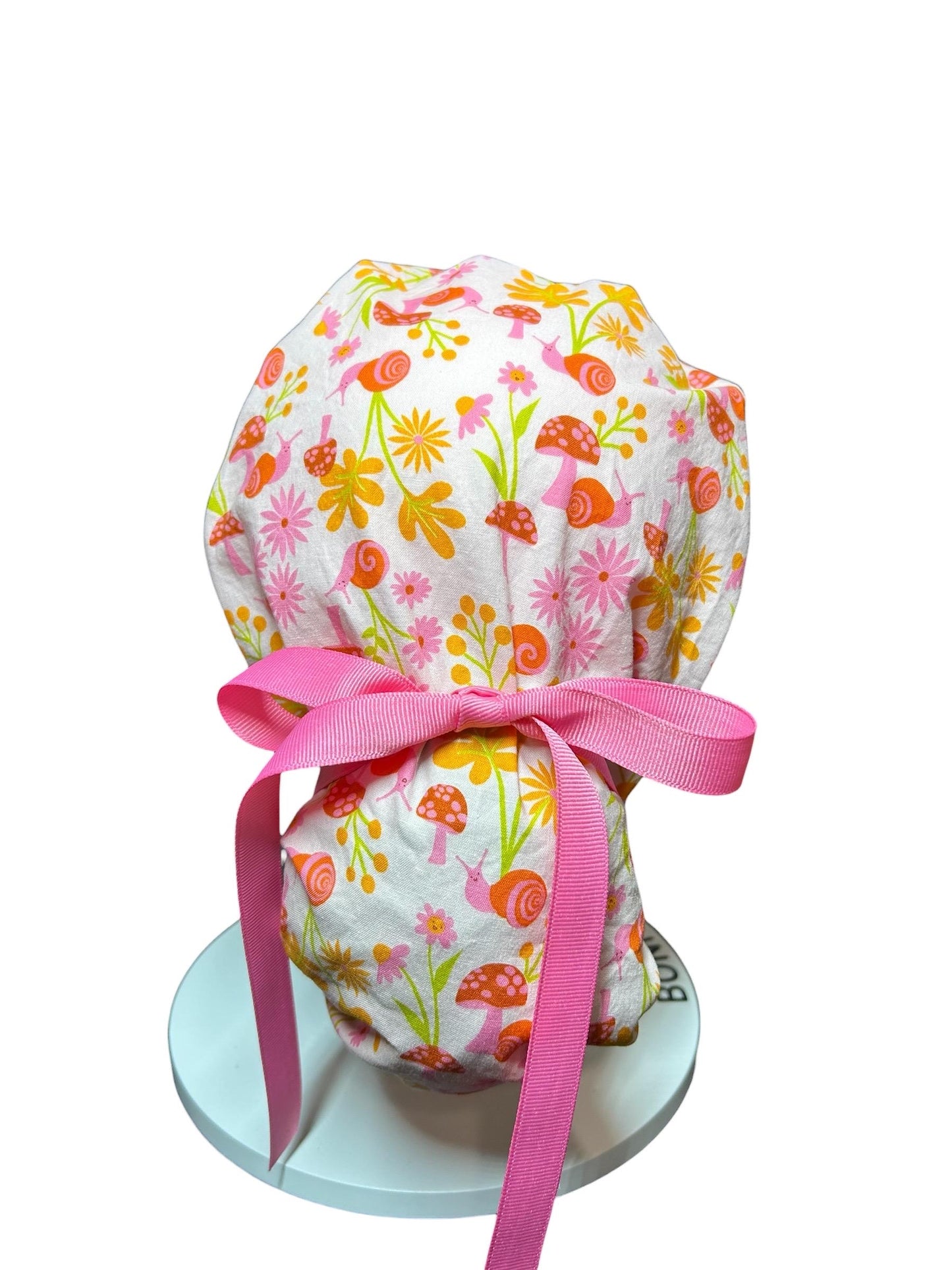 Women’s Ponytail Scrub Cap: Adjustable Cotton Scrub Hat in pink snail fabric