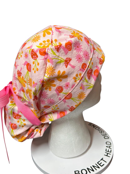 Women’s Ponytail Scrub Cap: Adjustable Cotton Scrub Hat in pink snail fabric
