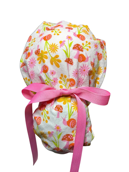 Women’s Ponytail Scrub Cap: Adjustable Cotton Scrub Hat in pink snail fabric
