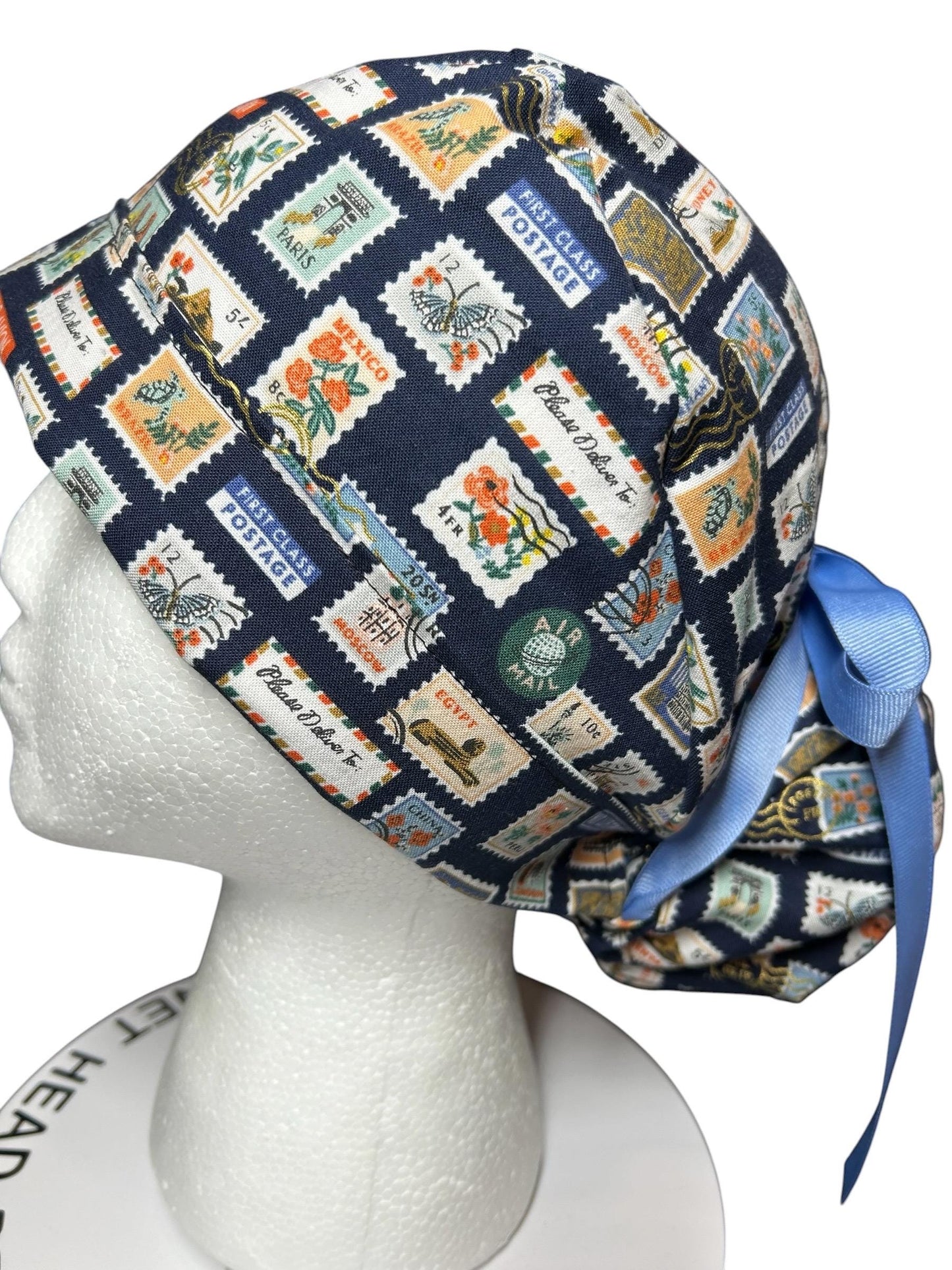 Women’s scrub cap: Rifle Paper Co navy stamp print with ribbon ties