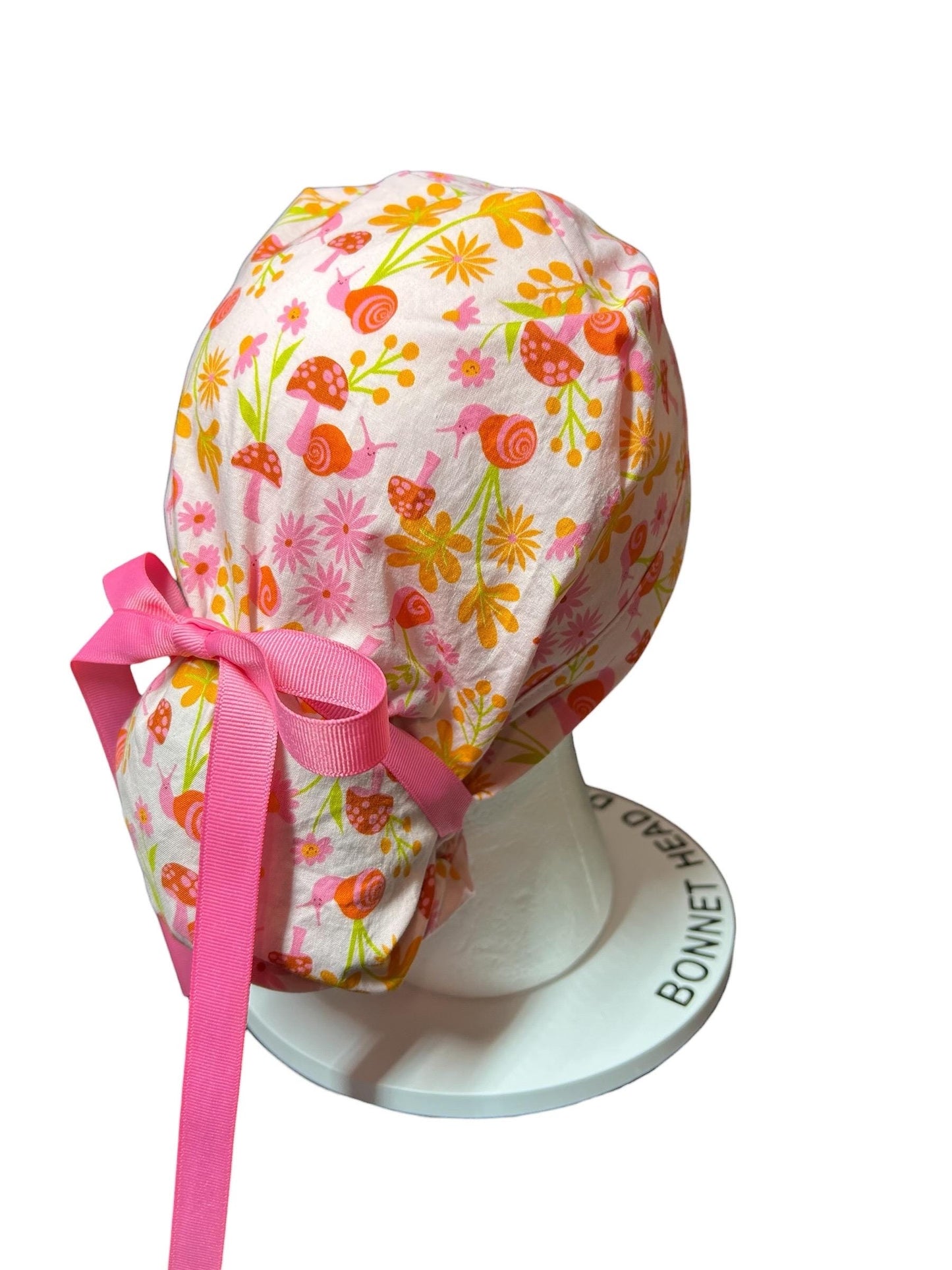 Women’s Ponytail Scrub Cap: Adjustable Cotton Scrub Hat in pink snail fabric